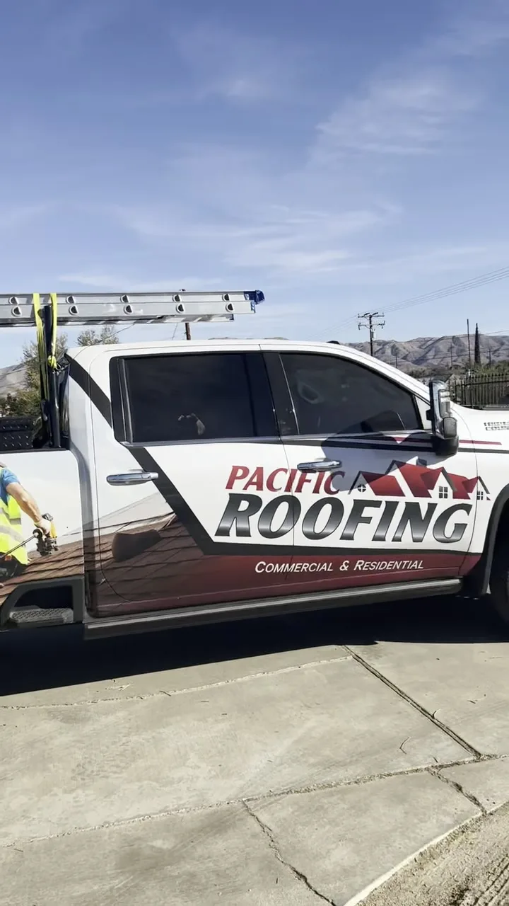 The Pacific Roofing truck and crew on a High Desert job